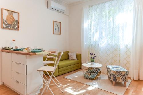 A seating area at Cosy & renovated 2BD flat near Vitoshka by Flat Mаnager