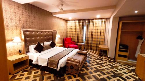 En eller flere senge i et værelse på Best Western Ashoka