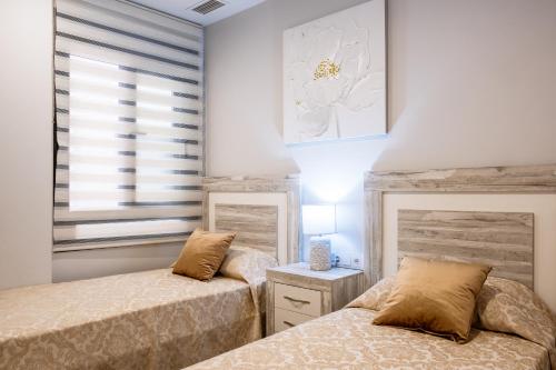 Posteľ alebo postele v izbe v ubytovaní NEW 2020 Residencial Aqua Beach -Apartment Torrevieja Center