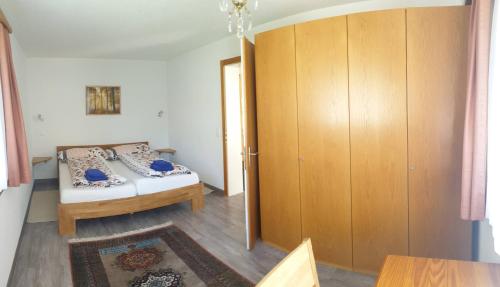 Ένα ή περισσότερα κρεβάτια σε δωμάτιο στο Casa Berger