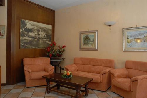 Zona de estar de Hotel Alpi - Foza