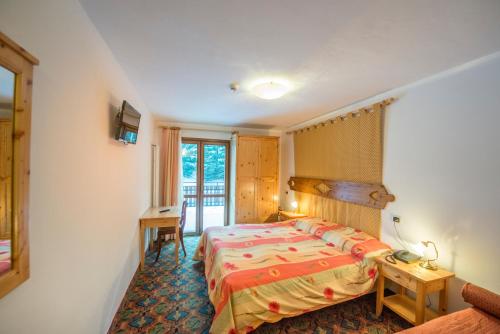 Postel nebo postele na pokoji v ubytování IHR Hotel Villa Emma