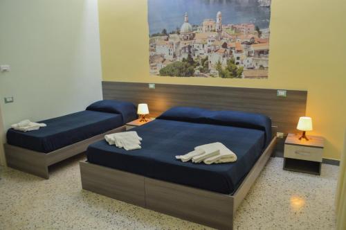 Una cama o camas en una habitación de La fontana de li Papi