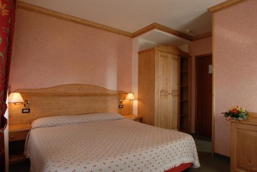 Cama o camas de una habitación en Hotel Alpi - Foza