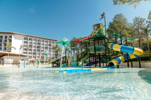 a large water park with a water slide at Novotel Itu Terras de São José Golf & Resort in Itu