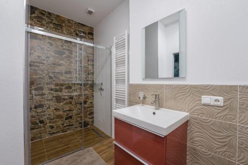 Ένα μπάνιο στο Ferienwohnung Heinzebank