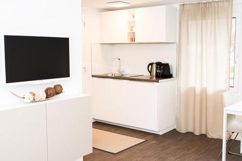 Kuchyň nebo kuchyňský kout v ubytování KELLER APARTMENT l 10L