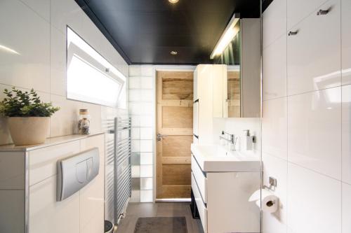 Kuchyň nebo kuchyňský kout v ubytování Vakantiehuis Vieverdwas - Yerseke