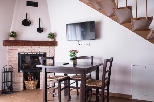 TV a/nebo společenská místnost v ubytování Apartamentos LA PARRA