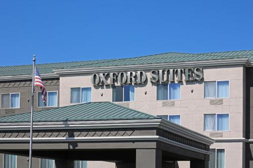 a hotel building with the words oxford suites at Oxford Suites Spokane Valley in Spokane Valley