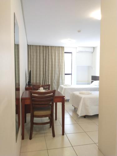 Кровать или кровати в номере Flat Athenas 611