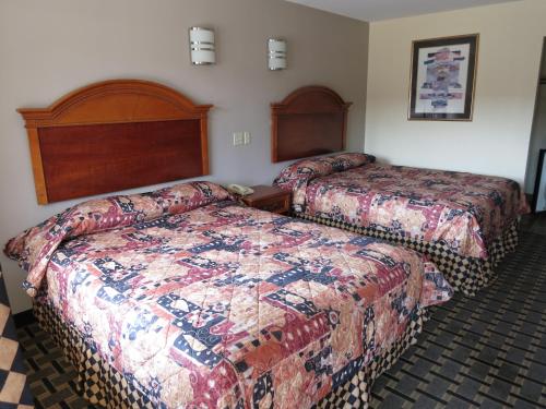 Llit o llits en una habitació de Inn at Mexia