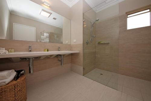 A bathroom at The Marina Hotel - Mindarie