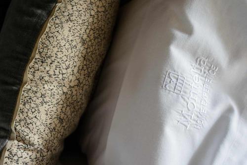 a close up of a persons arm with a white shirt at MONTELIA Ático El Ciervo de Panticosa in Panticosa