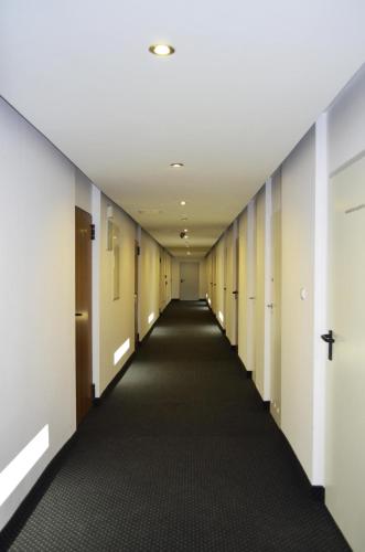 an empty hallway in an office building at Twój Hostel Klimczoka 7 in Katowice