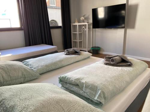 Postel nebo postele na pokoji v ubytování CITY MARITIME APARTMENT