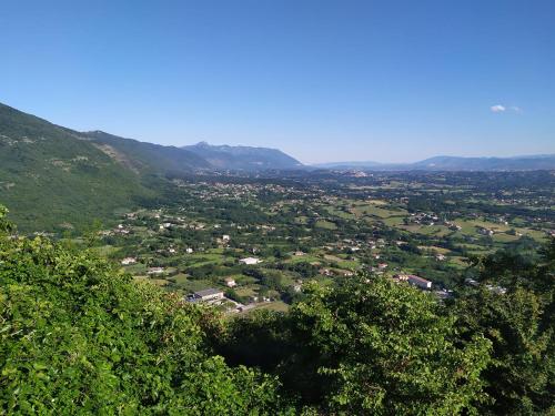a view of a town in a valley with mountains at Valle Fiorita in Castro dei Volsci