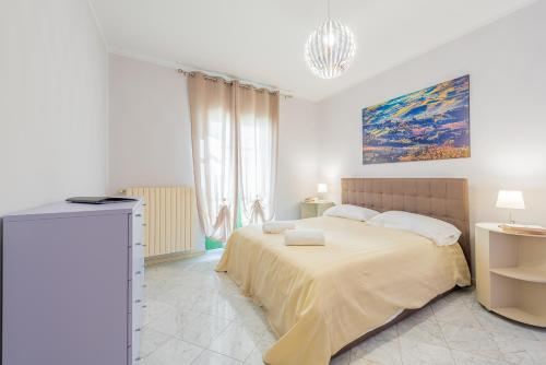 Cama o camas de una habitación en DiVino Holiday Apartments