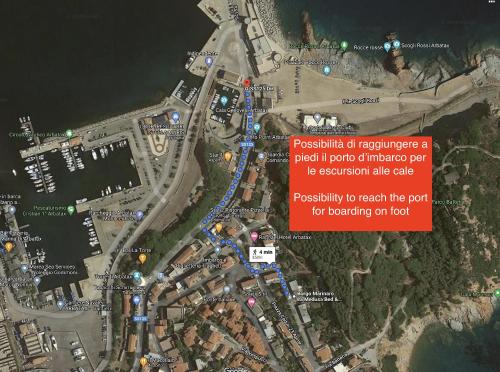a map of a parking lot with a map of a city at Borgo Marinaro La Medusa Arbatax - camera matrimoniale con bagno privato- in Àrbatax