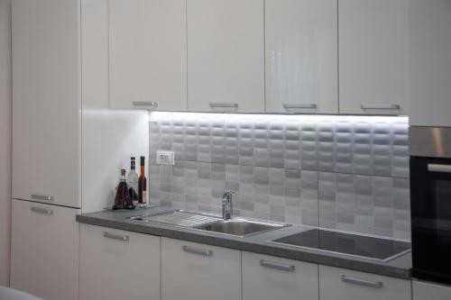 Kuchyňa alebo kuchynka v ubytovaní Apartment Fragola