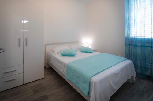Posteľ alebo postele v izbe v ubytovaní Apartment Fragola