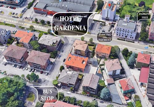 an overhead view of a city with houses and a bus stop at Hotel Gardenia in Verona