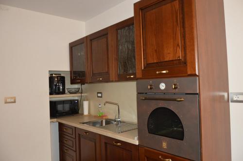 Kuchyň nebo kuchyňský kout v ubytování Apartment Kancler