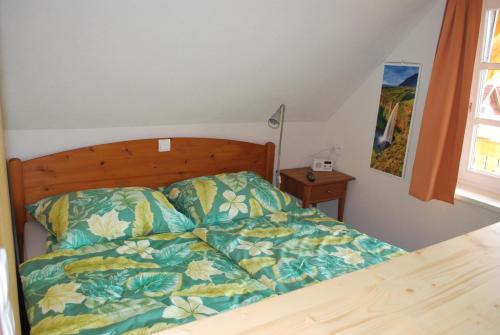 Postel nebo postele na pokoji v ubytování Ferienwohnung Zetzhirsch