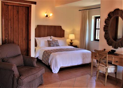 A bed or beds in a room at Liotrivi Historical Mansion and Boutique Hotel