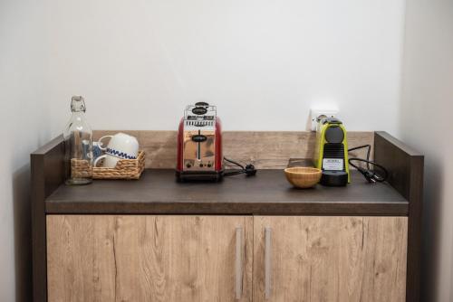 a kitchen counter with a toaster and other items on it at Le Due Torri in Ancona