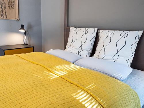 Ένα ή περισσότερα κρεβάτια σε δωμάτιο στο Design Apartment am Wasserbachhof