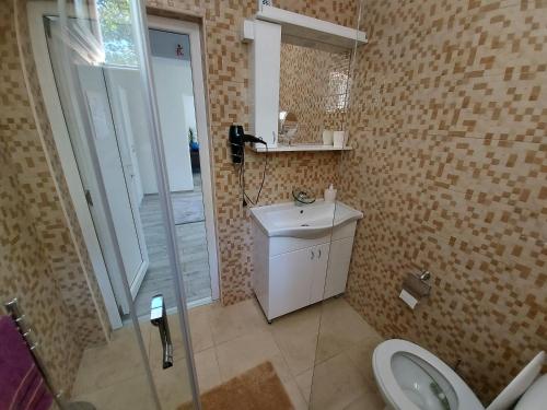 A bathroom at Fenix apartment & rooms