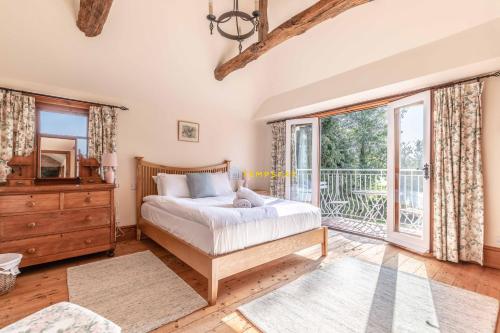Gulta vai gultas numurā naktsmītnē Chestnut Cottage - Stunning Countryside Views! PARKING, 4 BED, 3 BATHROOMS