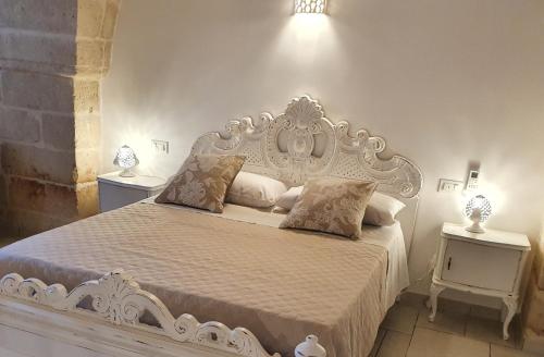 A bed or beds in a room at Dimora del ciliegino