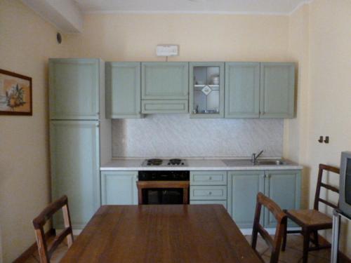 Kuchyň nebo kuchyňský kout v ubytování Appartamenti Belle Vacanze