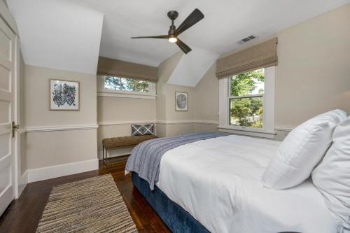 a bedroom with a bed and a ceiling fan at The Oxbow House - Designer 3BD/2BA Home in Napa