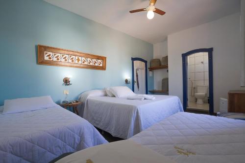 Postel nebo postele na pokoji v ubytování Hotel Serra Vista