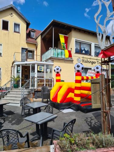 a large inflatable object in front of a building at Hübinger Treff 2 in Hübingen