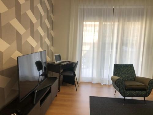 TV a/nebo společenská místnost v ubytování Home 22 Appartamento in centro storico - Catania