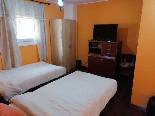Un ou plusieurs lits dans un hébergement de l'établissement Apartman IVANA