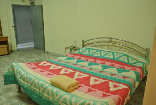 Giường trong phòng chung tại S.K. Residence