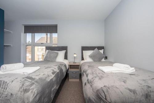 Ein Bett oder Betten in einem Zimmer der Unterkunft Central location for contractors, families and business travellers Ashford
