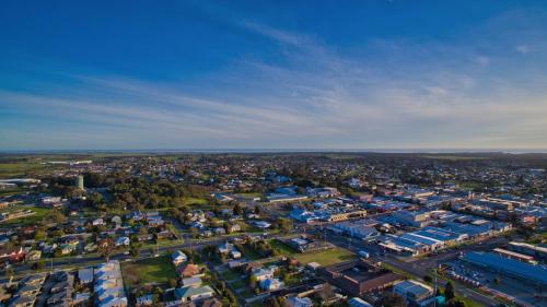 an aerial view of a city with many buildings at Wonthaggi Motel in Wonthaggi