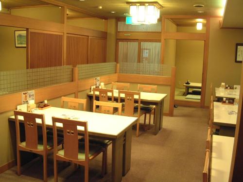 Un restaurante o sitio para comer en Grand Hotel Fujika