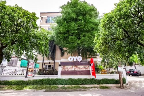 a building with a audi sign in front of it at OYO 254 Royal Pimand in Bangkok