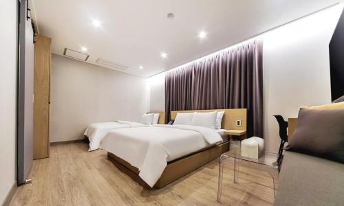 Letto o letti in una camera di Centro Hotel
