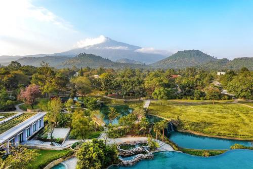 an aerial view of a resort with mountains in the background at Gran Melia Arusha in Arusha