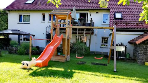 Zona de juegos para niños en Ferienwohnung Wiesenschneider´s
