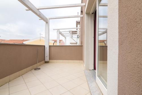 Balkón nebo terasa v ubytování Villetta Ermanno climatizzata con giardino privato
