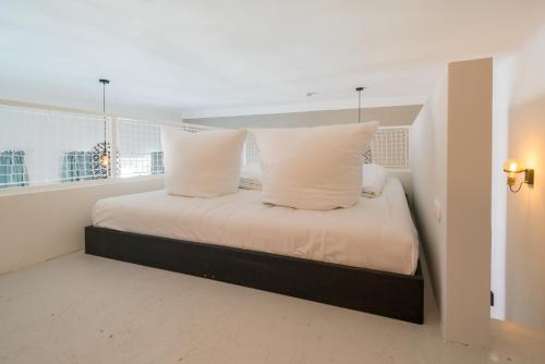 Кровать или кровати в номере Design Apartments -Innenstadt, Bäckerstr 8